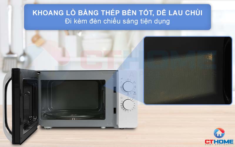 Khoang lò bằng thép phủ sơn chống dính dễ lau chùi, kèm đèn chiếu sáng.